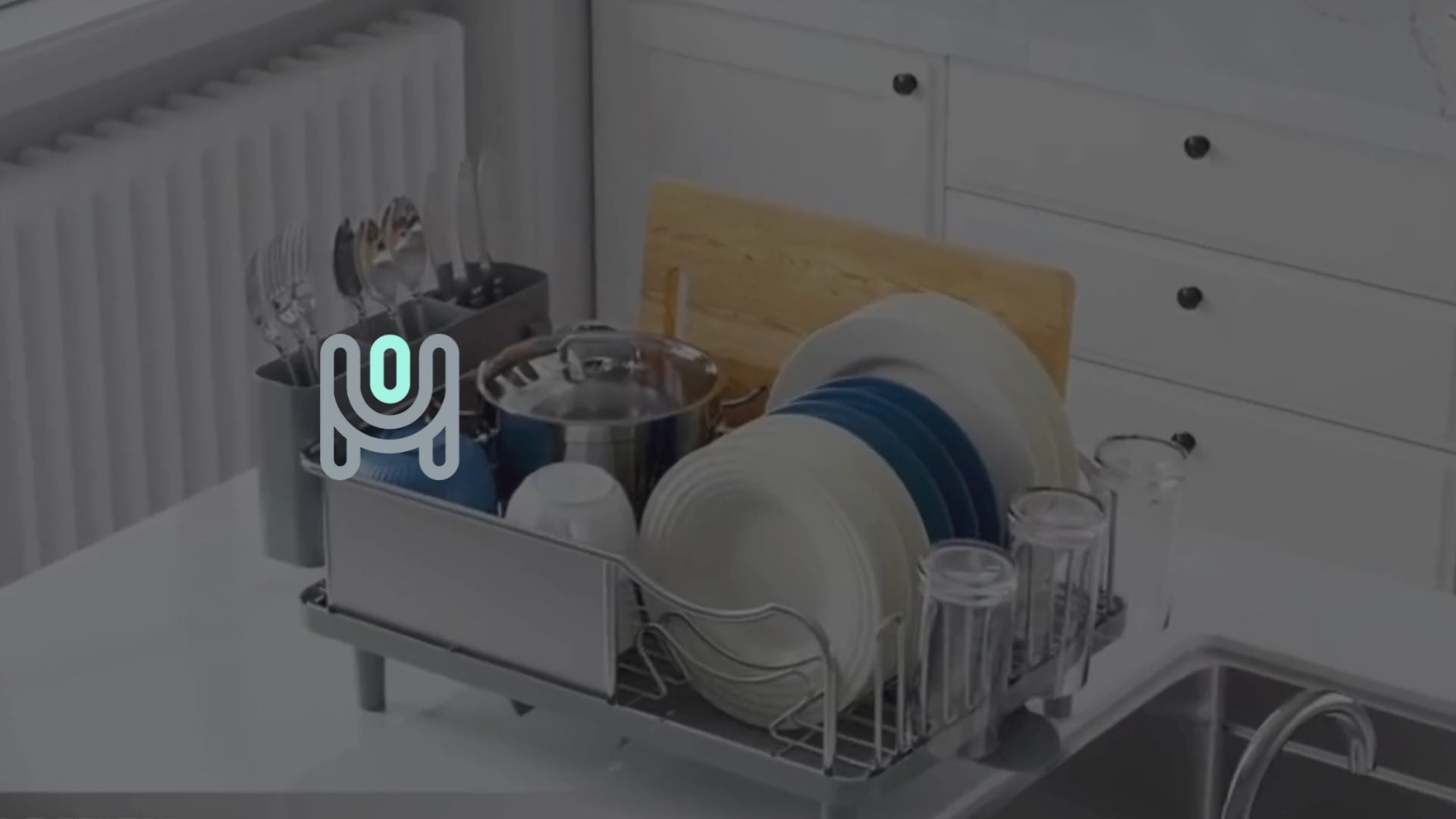 Load video: video of dishrack with dishes and draining water